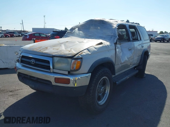 1998 Toyota 4Runner SR5 z VIN JT3GN86RXW0058568, wystawiony jako IAAI lot #38222829 z przebiegiem 217 390 mil mil oraz . Historia ofert i sprzedaży dostępna na DreamBid. Obrazek 2.