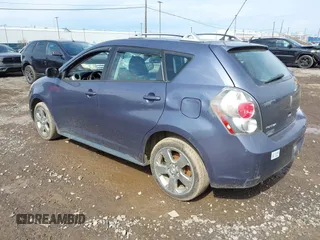 2009 Pontiac Vibe with VIN 5Y2SM67069Z422076, listed as a IAAI auction lot 42158045 with 180,568 mi miles. Bid and sale history available at carsss.com. Image 3.