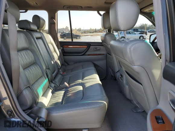 2006 Lexus LX 470 z VIN JTJHT00W664007502, wystawiony jako Copart lot #47871885 z przebiegiem 172 552 mil mil oraz Szkoda całkowita • Salvage title. Historia ofert i sprzedaży dostępna na DreamBid. Obrazek 11.