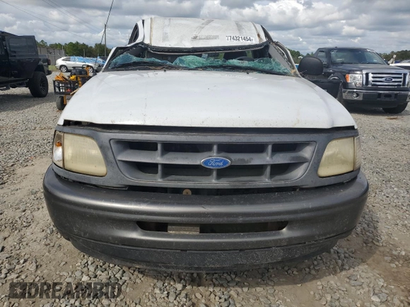1997 Ford F-150 with VIN 1FTDF17W0VNC92212, listed as a Copart auction lot 74321454 with 242,523 mi miles and Salvage title. Bid and sale history available at DreamBid. Image 5.