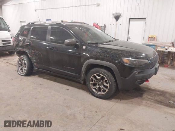 2020 Jeep Cherokee Trailhawk z VIN 1C4PJMBX4LD507364, wystawiony jako IAAI lot #41202333 z przebiegiem 90 000 mil mil oraz . Historia ofert i sprzedaży dostępna na DreamBid. Obrazek 1.