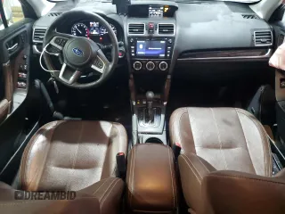 2017 Subaru Forester Touring with VIN JF2SJAWC7HH504086, listed as a Copart auction lot 44129835 with 104,970 mi miles and Salvage Title. Bid and sale history available at DreamBid. Image 8.