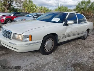 1999 Cadillac DeVille with VIN 1G6KD54Y2XU785069, listed as a IAAI auction lot 41630447 with 137,007 mi miles. Bid and sale history available at carsss.com. Image 2.