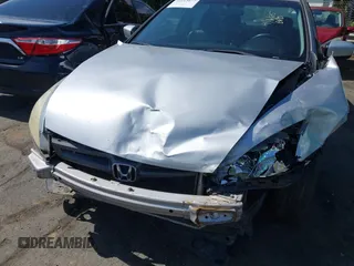 2005 Honda Accord EX with VIN 1HGCM56735A050655, listed as a IAAI auction lot 42115677 with 334,733 mi miles and . Bid and sale history available at DreamBid. Image 6.