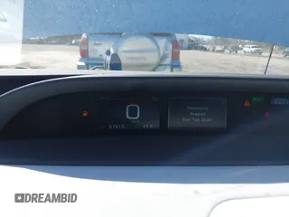 2021 Toyota Prius L Eco z VIN JTDKAMFUXM3142402, wystawiony jako IAAI lot #41665484 z przebiegiem 67 416 mil mil oraz . Historia ofert i sprzedaży dostępna na DreamBid. Obrazek 7.