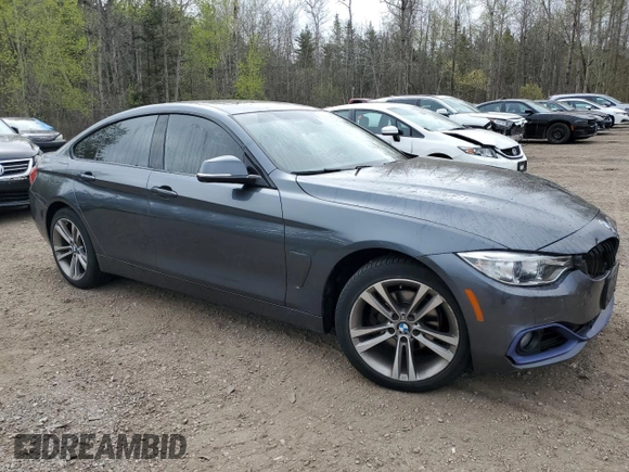 2015 BMW 4 Series 428i xDrive with VIN WBA4A7C5XFD413329, listed as a Copart auction lot 56034905 with 167,816 mi miles and Clean title. Bid and sale history available at DreamBid. Image 4.