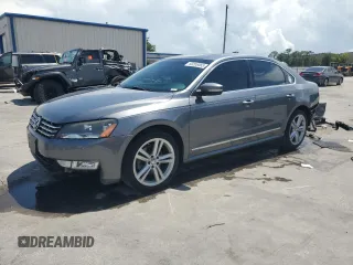 2015 Volkswagen Passat SEL Premium with VIN 1VWCV7A36FC007670, listed as a Copart auction lot 60208065 with 143,703 mi miles and Salvage title. Bid and sale history available at DreamBid. Image 1.