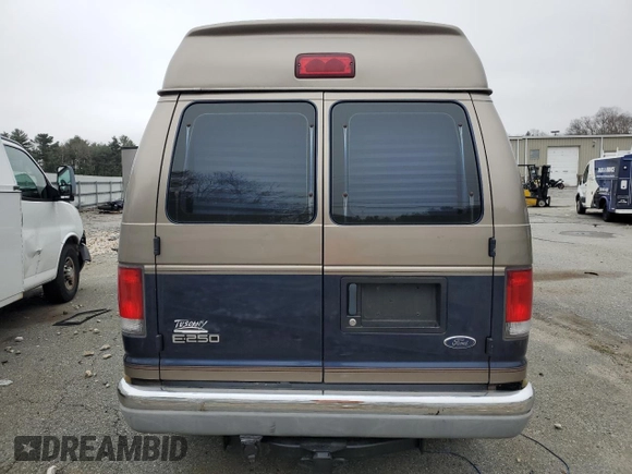 2001 Ford Econoline Cargo Recreational with VIN 1FDPE24L51HB59174, listed as a Copart auction lot 84857404 with 129,690 mi miles and Salvage Title. Bid and sale history available at DreamBid. Image 6.