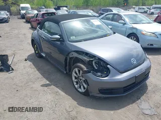 2013 Volkswagen Beetle 2.5L z VIN 3VW5P7ATXDM804051, wystawiony jako IAAI lot #42240396 z przebiegiem 103 660 mil mil oraz . Historia ofert i sprzedaży dostępna na DreamBid. Obrazek 1.