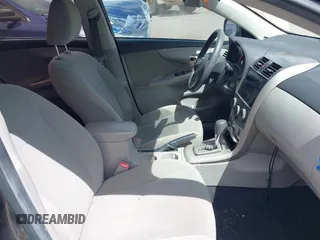 2011 Toyota Corolla L with VIN 2T1BU4EEXBC559590, listed as a IAAI auction lot 42101256 with 163,307 mi miles and . Bid and sale history available at DreamBid. Image 5.