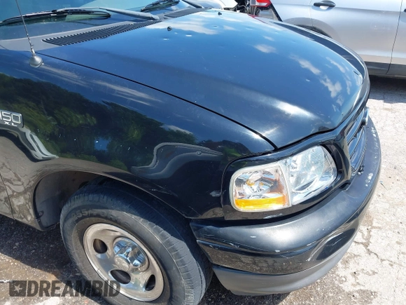 2002 Ford F-150 XL z VIN 1FTRF17292NA08851, wystawiony jako IAAI lot #42559503 z przebiegiem Nie podano mil oraz . Historia ofert i sprzedaży dostępna na DreamBid. Obrazek 6.