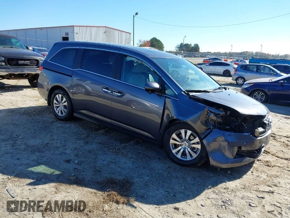 2016 Honda Odyssey EX-L with VIN 5FNRL5H69GB047902, listed as a IAAI auction lot 40795564 with 124,788 mi miles. Bid and sale history available at carsss.com. Image 1.