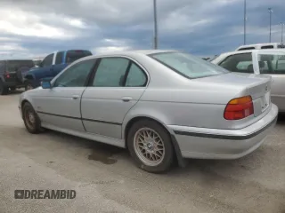 1999 BMW 5 Series 528iA with VIN WBADM6332XBY30585, listed as a Copart auction lot 74830704 with 0 mi miles and Salvage Title. Bid and sale history available at carsss.com. Image 2.