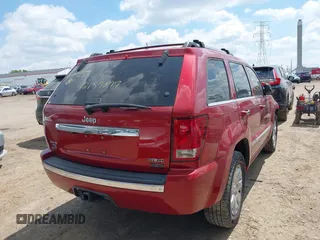 2009 Jeep Grand Cherokee with VIN 1J8HR68T79C539925, listed as a IAAI auction lot 42157077 with 140,443 mi miles and . Bid and sale history available at DreamBid. Image 4.