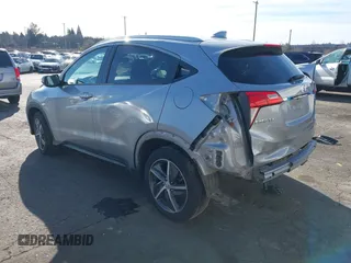 2021 Honda HR-V EX with VIN 3CZRU6H59MM749892, listed as a IAAI auction lot 41550074 with 61,590 mi miles. Bid and sale history available at carsss.com. Image 3.