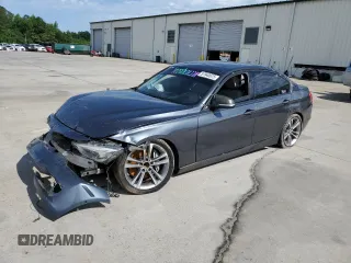 2012 BMW 3 Series 335i with VIN WBA3A9C5XCF474803, listed as a Copart auction lot 57940675 with 121,960 mi miles and Salvage title. Bid and sale history available at DreamBid. Image 1.