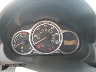 2014 Mazda 2 Sport z VIN JM1DE1KZ7E0186633, wystawiony jako Copart lot #59354705 z przebiegiem 111 234 mil mil oraz Szkoda całkowita • Salvage title. Historia ofert i sprzedaży dostępna na DreamBid. Obrazek 9.