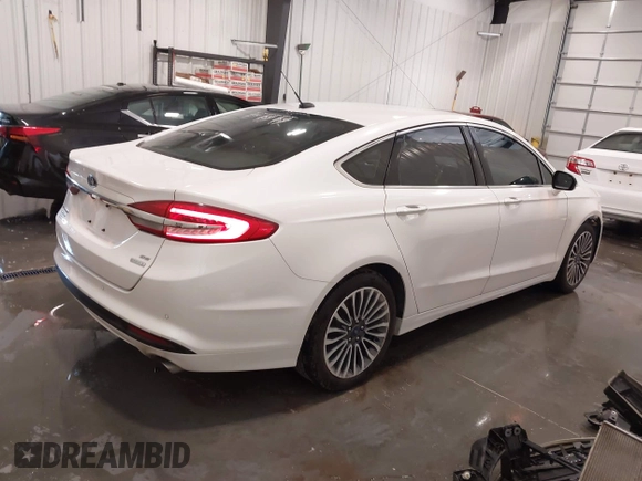 2017 Ford Fusion SE z VIN 3FA6P0HD5HR367474, wystawiony jako IAAI lot #42179210 z przebiegiem 81 852 mil mil oraz . Historia ofert i sprzedaży dostępna na DreamBid. Obrazek 4.