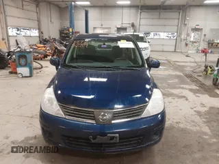 2009 Nissan Versa 1.8 S with VIN 3N1BC11E79L440560, listed as a IAAI auction lot 41975289 with 158,726 mi miles. Bid and sale history available at carsss.com. Image 13.