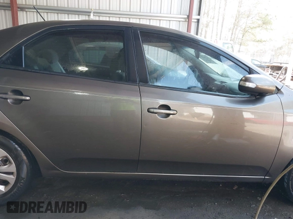 2010 Kia Forte EX with VIN KNAFU4A26A5882153, listed as a IAAI auction lot 41904559 with 162,554 mi miles. Bid and sale history available at carsss.com. Image 13.