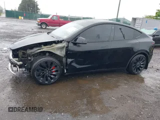 2022 Tesla Model Y Performance z VIN 7SAYGDEF7NF457757, wystawiony jako IAAI lot #42263449 z przebiegiem 65 747 mil mil oraz . Historia ofert i sprzedaży dostępna na DreamBid. Obrazek 15.