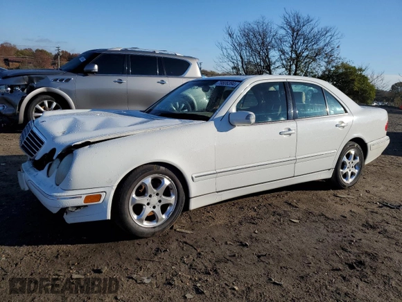 2002 Mercedes-Benz E-Class with VIN WDBJF65J62B423016, listed as a Copart auction lot 79806394 with 154,537 mi miles and Salvage Title. Bid and sale history available at carsss.com. Image 1.