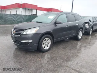 2014 Chevrolet Traverse LT with VIN 1GNKVGKDXEJ312984, listed as a IAAI auction lot 41079999 with 143,029 mi miles. Bid and sale history available at carsss.com. Image 2.