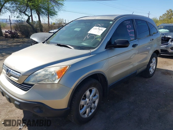 2009 Honda CR-V EX with VIN JHLRE38599C007909, listed as a IAAI auction lot 42077656 with 223,597 mi miles and . Bid and sale history available at carsss.com. Image 2.