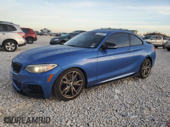 2015 BMW 2 Series M235i with VIN WBA1J7C59FV359017, listed as a Copart auction lot 82226554 with 87,881 mi miles and Salvage Title. Bid and sale history available at carsss.com. Image 1.