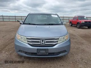 2011 Honda Odyssey EX-L with VIN 5FNRL5H64BB085479, listed as a IAAI auction lot 42404637 with 185,624 mi miles and . Bid and sale history available at DreamBid. Image 12.