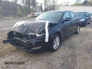 2012 Kia Optima LX with VIN KNAGM4A75C5277916, listed as a IAAI auction lot 41920967 with 274,972 mi miles and . Bid and sale history available at carsss.com. Image 2.