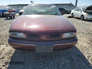 1998 Oldsmobile 88 LS z VIN 1G3HN52K9W4864871, wystawiony jako Copart lot #56519145 z przebiegiem Nie podano mil oraz Szkody całkowita. Historia ofert i sprzedaży dostępna na DreamBid. Obrazek 5.