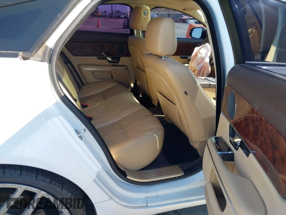 2012 Jaguar XJ with VIN SAJWA1CB6CLV34389, listed as a IAAI auction lot 42473712 with 132,515 mi miles and . Bid and sale history available at DreamBid. Image 8.