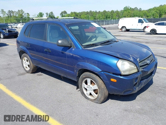 2005 Hyundai Tucson GL with VIN KM8JM12B85U233228, listed as a IAAI auction lot 42051627 with 170,742 mi miles. Bid and sale history available at carsss.com. Image 1.