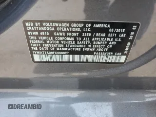 2015 Volkswagen Passat Limited Edition with VIN 1VWAT7A30FC098027, listed as a Copart auction lot 60612055 with 121,208 mi miles and Salvage title. Bid and sale history available at DreamBid. Image 12.