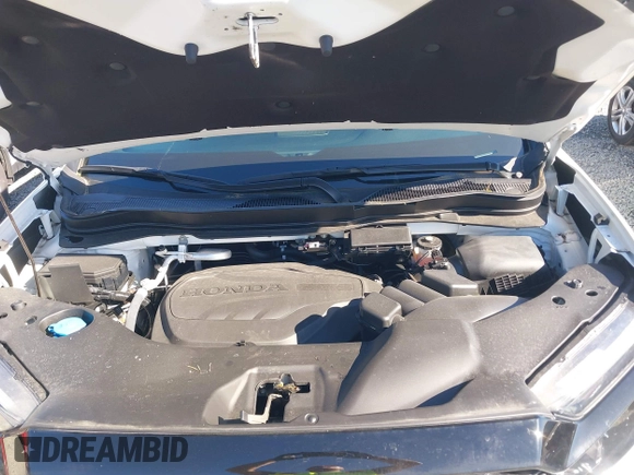 2023 Honda Passport Elite with VIN 5FNYF8H01PB004087, listed as a IAAI auction lot 42045433 with 20,677 mi miles and . Bid and sale history available at DreamBid. Image 10.