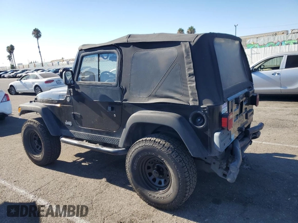 2005 Jeep Wrangler Rubicon with VIN 1J4FA69SX5P343826, listed as a Copart auction lot 69074374 with 179,610 mi miles and Salvage Title. Bid and sale history available at carsss.com. Image 2.