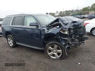 2017 Chevrolet Tahoe LT z VIN 1GNSKBKC2HR160790, wystawiony jako IAAI lot #41834352 z przebiegiem 100 672 mil mil oraz . Historia ofert i sprzedaży dostępna na DreamBid. Obrazek 1.