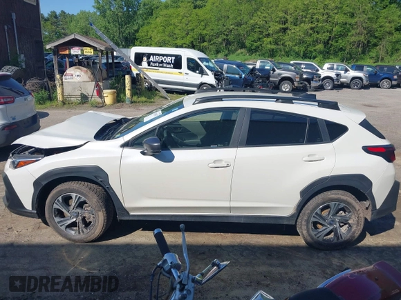 2024 Subaru Crosstrek Premium z VIN JF2GUADC0R8873664, wystawiony jako IAAI lot #42395857 z przebiegiem 11 924 mil mil oraz . Historia ofert i sprzedaży dostępna na DreamBid. Obrazek 14.