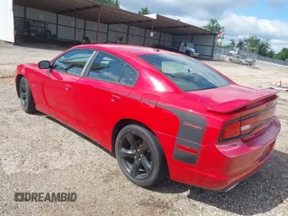 2013 Dodge Charger RT with VIN 2C3CDXCT7DH647923, listed as a IAAI auction lot 41934831 with 136,015 mi miles. Bid and sale history available at carsss.com. Image 3.