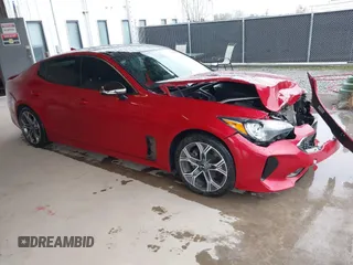 2020 Kia Stinger GT-Line with VIN KNAE15LAXL6080443, listed as a IAAI auction lot 41284873 with 83,475 mi miles. Bid and sale history available at carsss.com. Image 1.