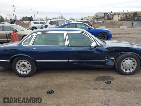 1998 Jaguar XJ Vanden Plas with VIN SAJKX6246WC832202, listed as a IAAI auction lot 41218807 with 96,589 mi miles and . Bid and sale history available at DreamBid. Image 13.