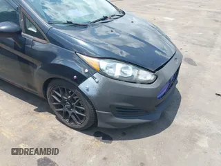 2018 Ford Fiesta S z VIN 3FADP4AJ0JM131607, wystawiony jako IAAI lot #42707624 z przebiegiem 109 815 mil mil oraz . Historia ofert i sprzedaży dostępna na DreamBid. Obrazek 12.