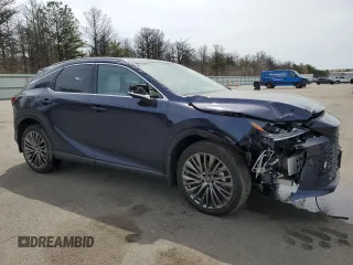 2024 Lexus RX 450h+ Luxury with VIN JTJCJMGA5R2022672, listed as a Copart auction lot 53726055 with 3,963 mi miles and Salvage title. Bid and sale history available at DreamBid. Image 4.