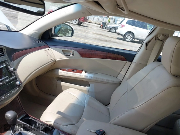 2012 Toyota Avalon with VIN 4T1BK3DB2CU462309, listed as a IAAI auction lot 42665403 with 128,490 mi miles and . Bid and sale history available at DreamBid. Image 5.