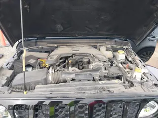2021 Jeep Gladiator Freedom z VIN 1C6HJTAG4ML586999, wystawiony jako IAAI lot #41911751 z przebiegiem 81 030 mil mil oraz . Historia ofert i sprzedaży dostępna na DreamBid. Obrazek 10.