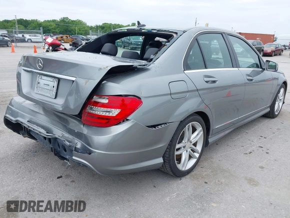 2014 Mercedes-Benz C 250 Sport with VIN WDDGF4HB6EG160494, listed as a IAAI auction lot 42310423 with 145,160 mi miles and . Bid and sale history available at DreamBid. Image 4.