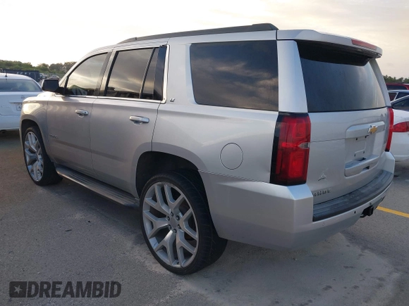 2015 Chevrolet Tahoe LT with VIN 1GNSCBKC2FR232095, listed as a IAAI auction lot 42718627 with 174,130 mi miles and . Bid and sale history available at DreamBid. Image 3.