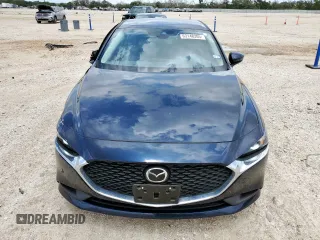 2021 Mazda 3 S z VIN JM1BPAAL3M1321131, wystawiony jako Copart lot #63148205 z przebiegiem 9 910 mil mil oraz Szkoda całkowita • Salvage title. Historia ofert i sprzedaży dostępna na DreamBid. Obrazek 5.