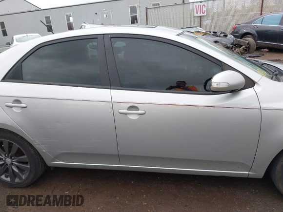 2010 Kia Forte SX with VIN KNAFW4A39A5230517, listed as a IAAI auction lot 41953297 with 154,711 mi miles. Bid and sale history available at carsss.com. Image 14.